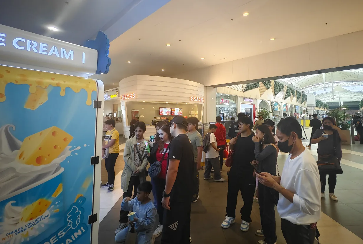 Candidate ice cream vending position showing the customer approach, standing area and service access